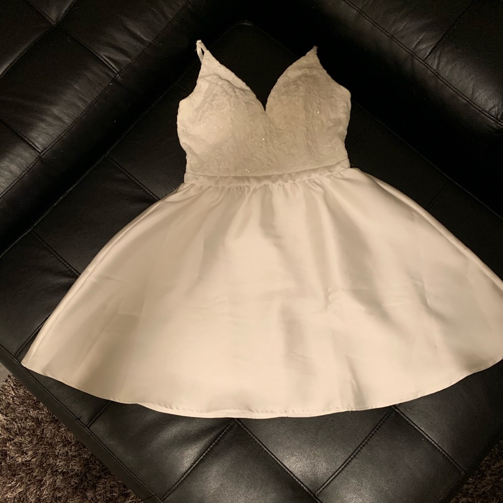 White grad sweet sixteen dress.